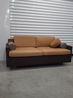 Modern leather and velvet couch