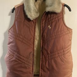 1052. Preowned Cowgirl Vest With Faux Fur Trim Size Medium  $7.00
