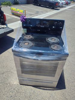 Frigidaire electric range 4 burner stainless steel and black