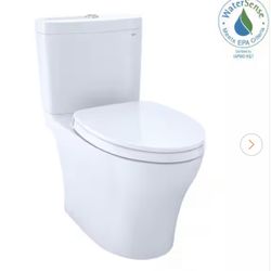 Aquia IV 12 in. Rough In 2-Piece 0.9/1.28 GPF Dual Flush Elongated Toilet Comfort Height in Cotton White Seat Included