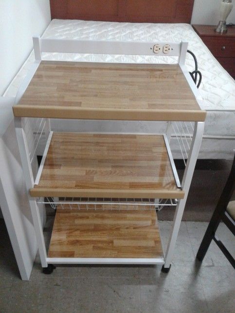 New, small microwave stand with shelf and pull out basket