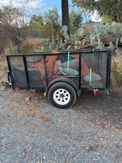 Single Axle Utility Trailer with Mesh Sides 4’ wide x 8’ long