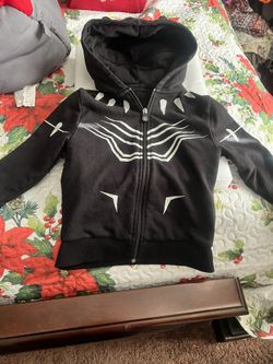 Stylish Marvel hoodie with bold black and white design. Features iconic superhero elements. Comfortable and perfect for everyday wear.  New no tags Si