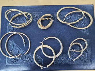 6 pairs of barely worn hoops.