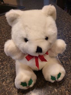 White Christmas bear with red ribbon and holly design on feet/paws