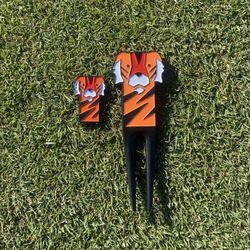 Tiger Divot Tool And Ball Marker