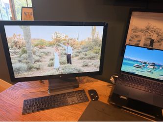 Apple Thunderbolt Display 27” works great ! Have all cables