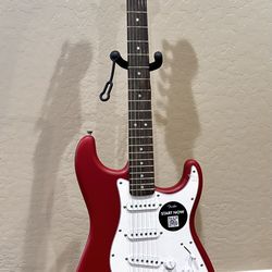 Cherry Red Electric Fender by Squier Stratocaster Guitar