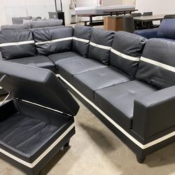 Black Sectional Easy to Clean With Storage Ottoman  New Was $1299 Now $750  