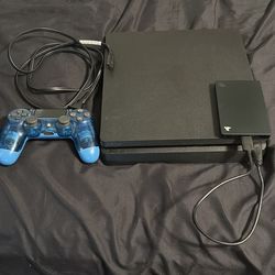 PS4 slim in perfect condition, with cable and controller.