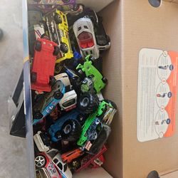 Various hot wheels and matchbox cars.