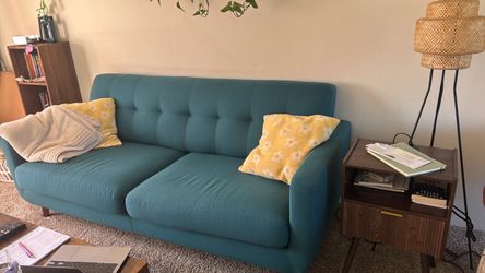 Blue living spaces couch