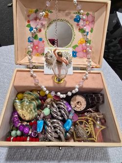 Music box with ballerina, jewelry compartments, and more