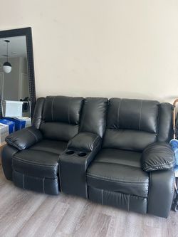 Black Faux Leather Reclining Loveseat with Console