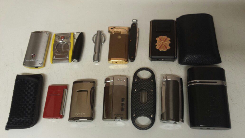 Cigar cutters and pipe lighters