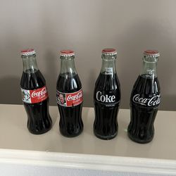 4  Coca Cola Bottles 