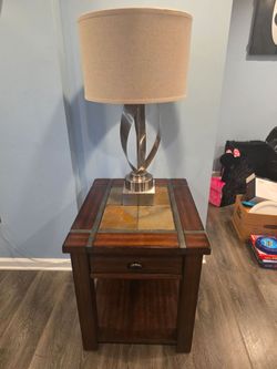 2 end tables and coffee table with storage on wheels
