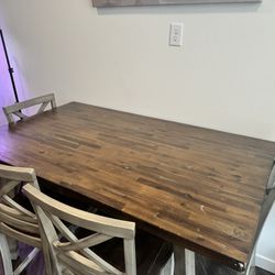 Solid Wood Dining Table And Four Chairs