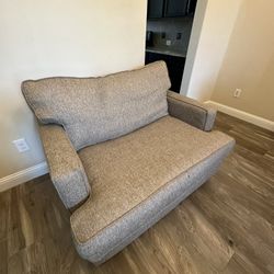 Loveseat / oversized armchair, Good Condition, Neutral Brown, 