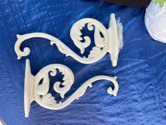 Outdoor/Indoor Pair of Heavy Cast Iron Wall Hangers, New.