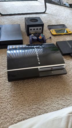 PS3 Original 40gb with a bunch of AAA games