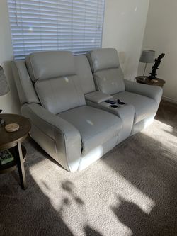 Leather love seat electric recliner with adjustable headrest and lumbar