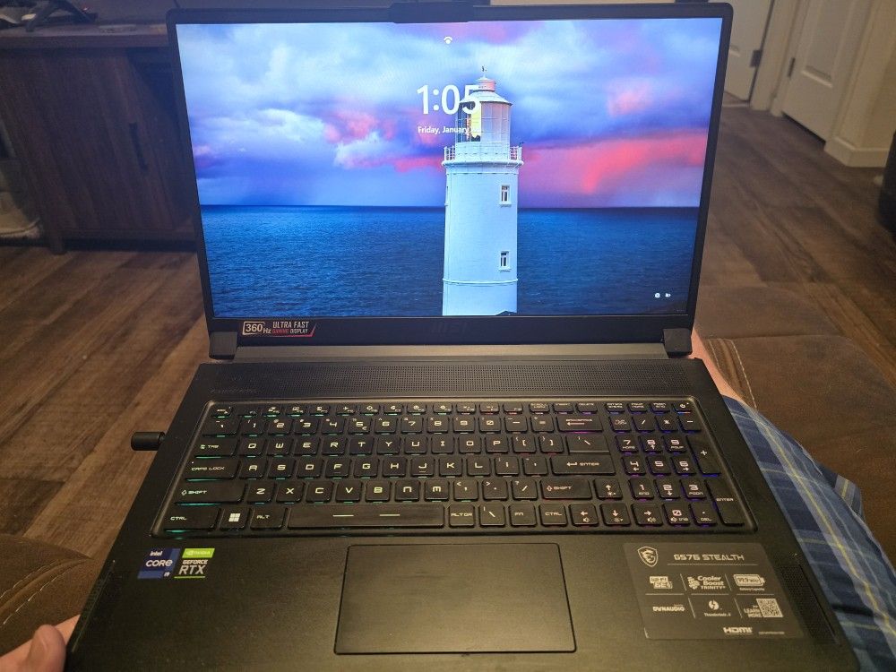 MSI GS76 gaming laptop with backpack