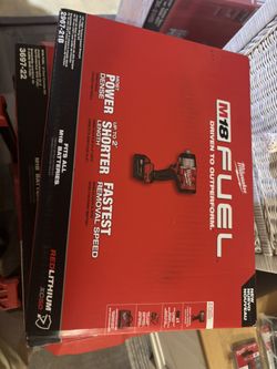 Brand new Milwaukee impact wrench with 50 battery in the box brand new