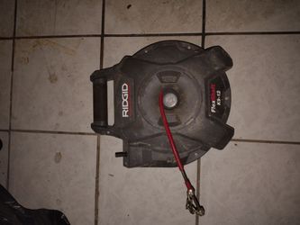 Rigid flex shaft drain cleaning machine