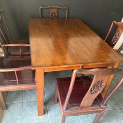 Hard Wood Table And 6 Chairs