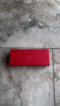 Cartier Red and gold bax with cartier glasses, mini bag and cloth
