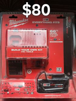 MILWAUKEE M18  5.0 BATTERY AND CHARGER 