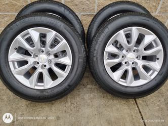 20" factory Chevy wheels with Michelin  275 60 r20 Michelin defender LTX m/s2 tires  only 1000.00 great deal