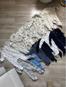 14 Onsies size 0-3 months