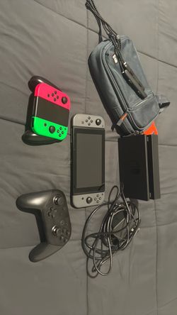 Switch v2 bundle 256 gb sd card and carrying case pro controller and extra joy cons 280 obo