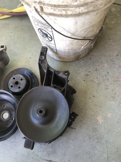 Iroc,serpentine belt brackets,pulleys and power steering pump..$100..90’s set up,will work on all older chevy blocks.