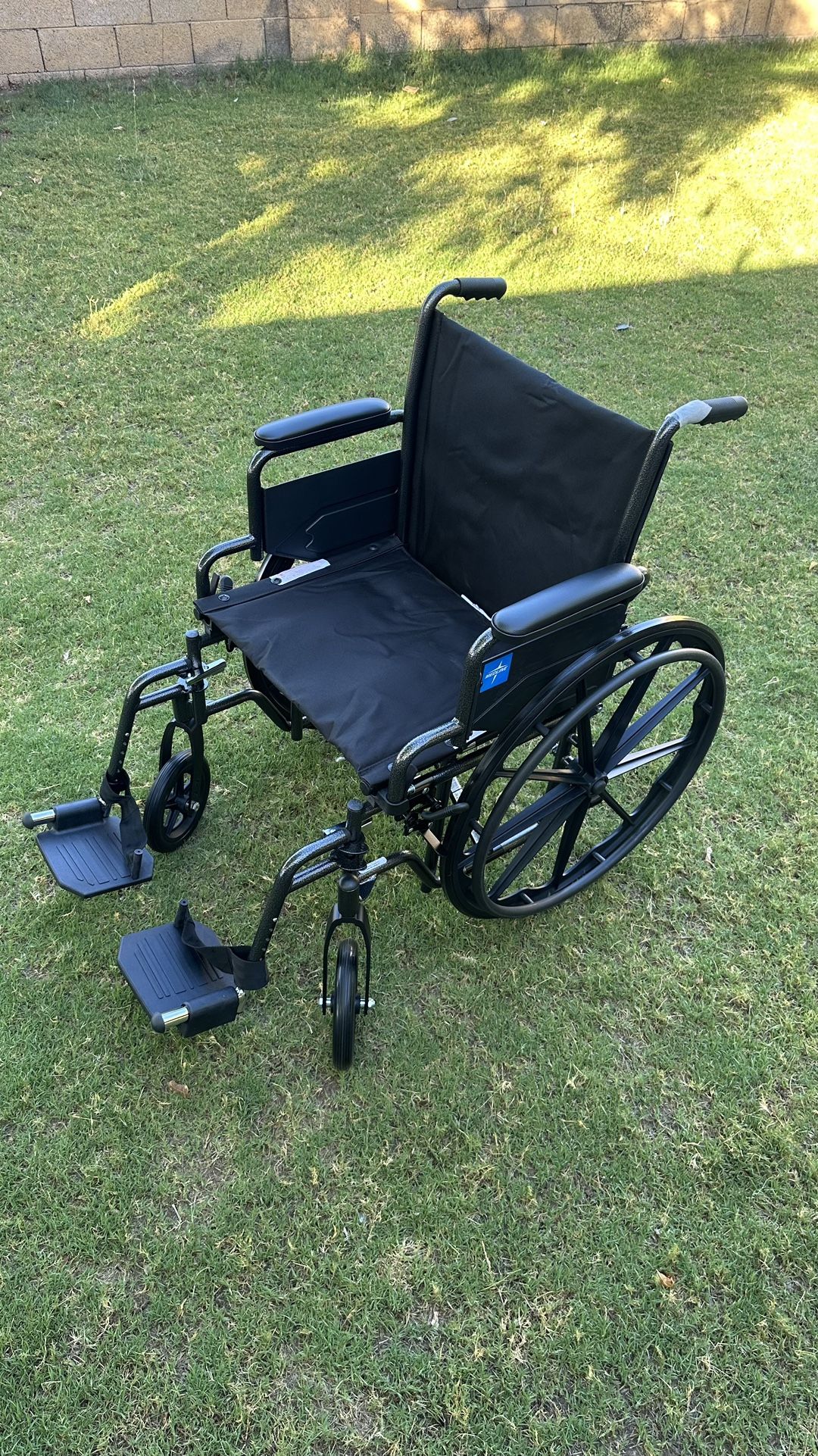 New Folding Wheelchair