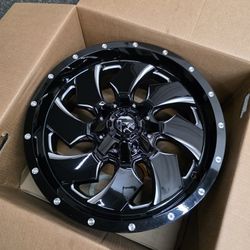 20" Fuel Cleaver rims.  Black/chrome 20x9"  No Lift Kit Needed