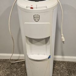 Glacier Bay water dispenser. 
120V 60Hz 4.65 A
Water bottle sits on top.