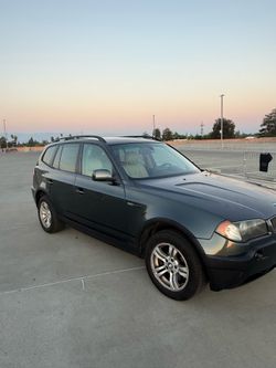 2006 bmw x3 suv smog at hand