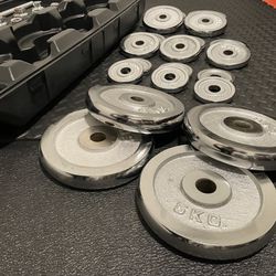 Case Of Adjustable Chromed Weights With Barbell And Dumbbell Bars