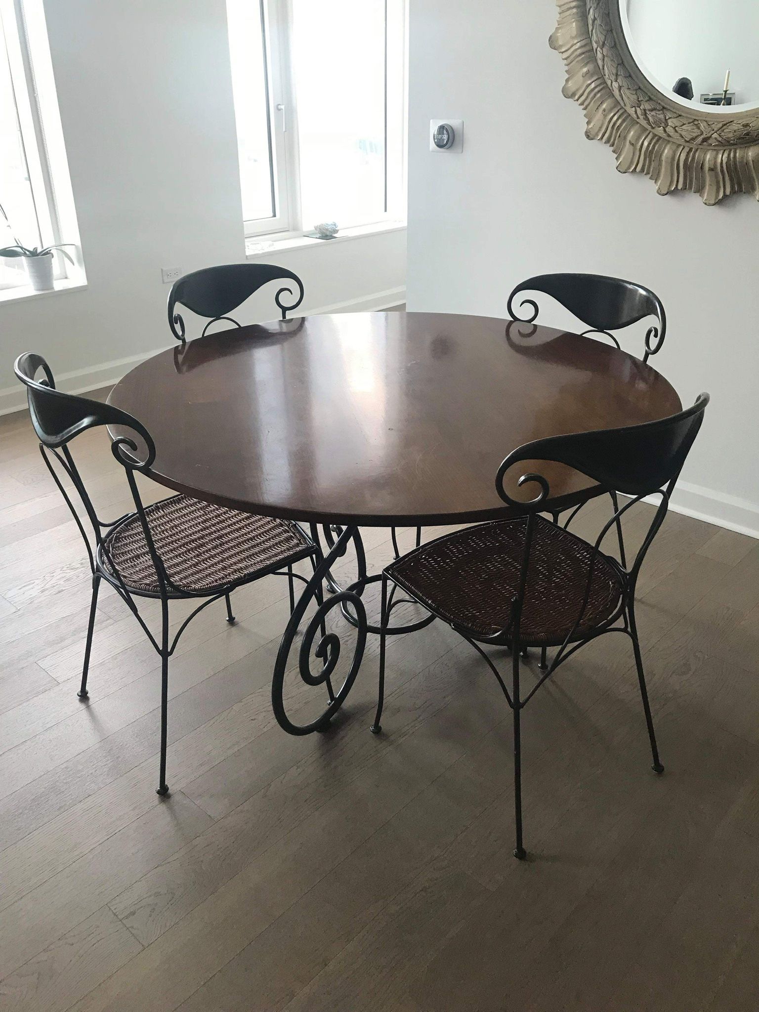 Mahogany Table With Rod Iron Chairs With Cane Seating