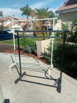 1 Double Bar Clothing Rack and 1 Clothing Rack with Bottom Shelf and wheels