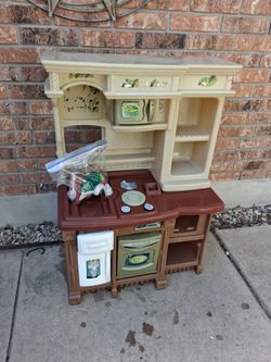 Step 2 play kitchen toy just sticker peel off but in good condition clean