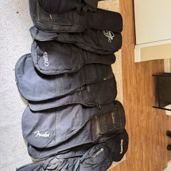 Guitar cases group of 12