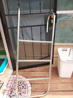 Nickel plated boat ladder hanging off the side never rust