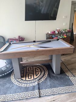 Pool Table with Cue Sticks