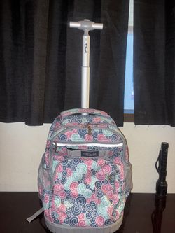 Tilami rolling backpack featuring a colorful swirl pattern