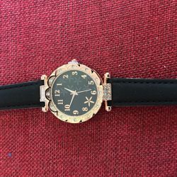 Woman’s CZ/ Gold Watch