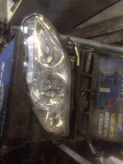 2010 Toyota Corolla driver side headlight